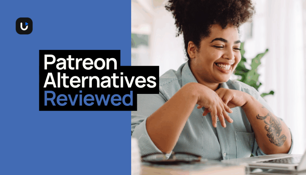 Smiling woman with curly hair and tattoos working on a laptop, with text overlay reading 'Patreon Alternatives Reviewed' on a blue and black design background