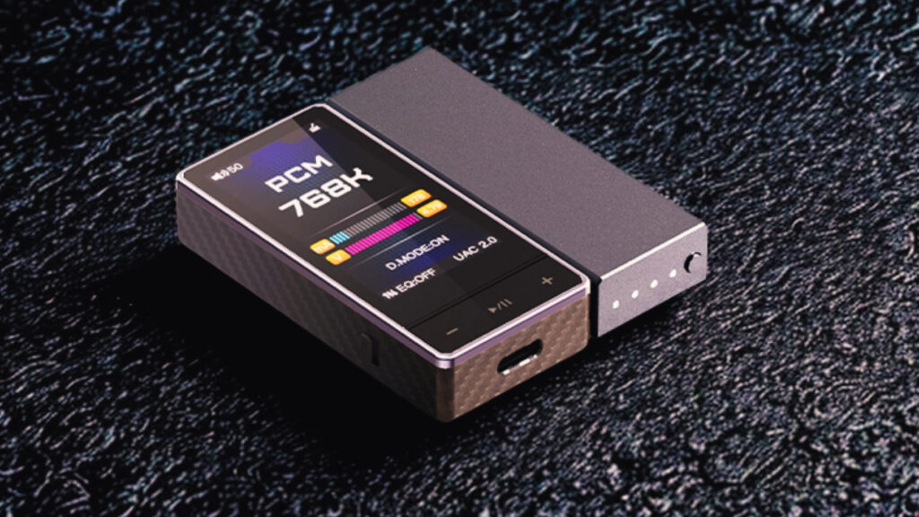 FiiO QX13 on a gray table