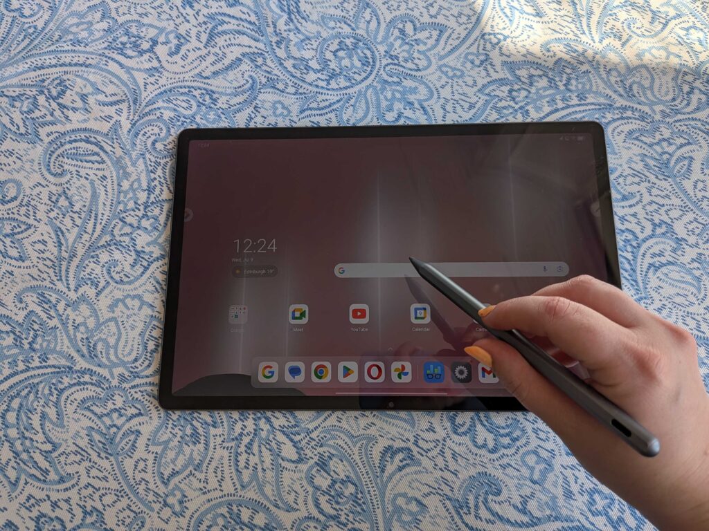 A Lenovo Idea Tab Pro tablet on a blue and white table
