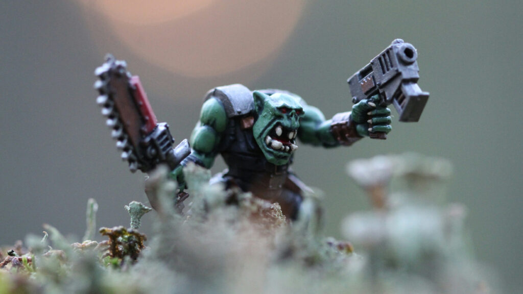 A Warhammer 40,000 ork, looking angry