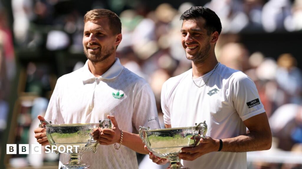 Lloyd Glasspool and Julian Cash after their Wimbledon men's doubles win on Centre Court Wimbledon