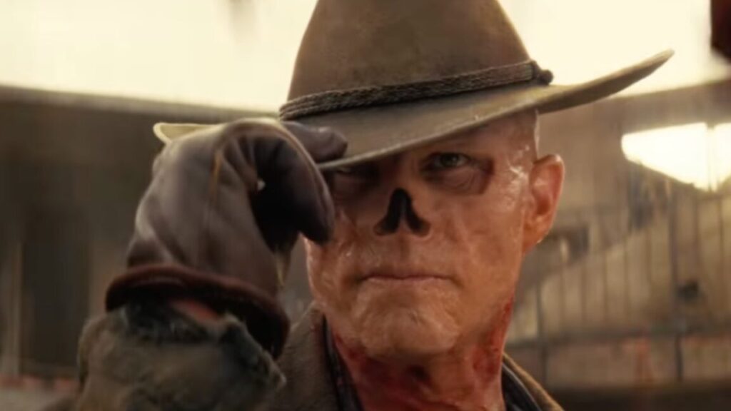 a ravaged ghoul with no nose tips his hat