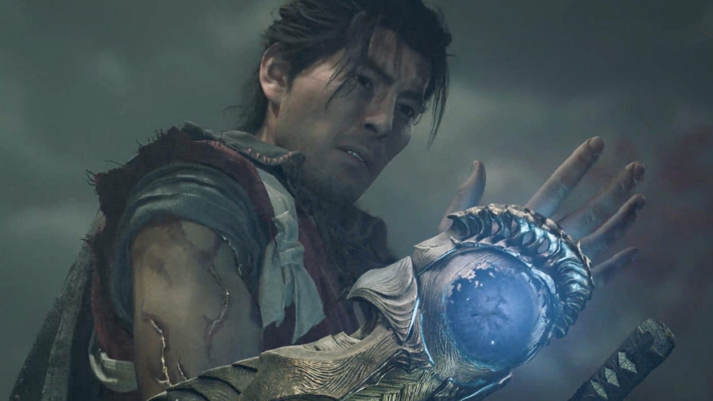 An in-game screenshot of a cinematic where a man wearing a sword looks at a demon-infused gauntlet on his arm.