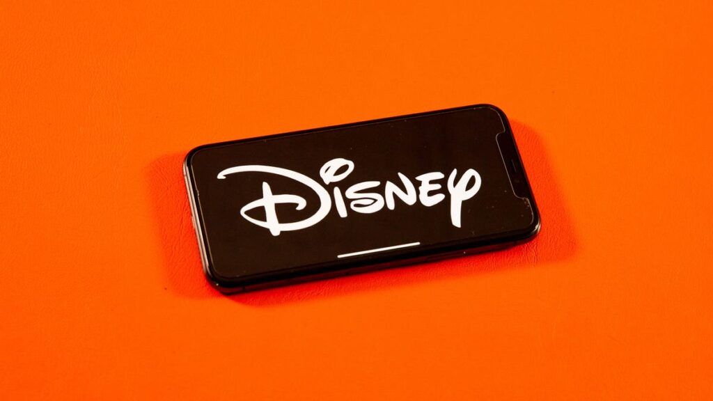 Disney corporate logo on a phone screen