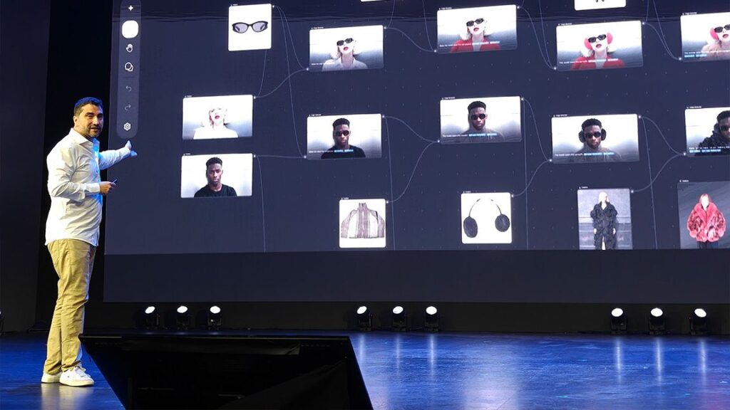 Freepik reveals Spaces, a fresh take on a crowded creative idea Freepik Spaces; a man gestures at a video wall of images