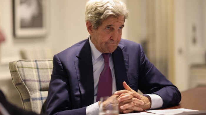 John Kerry ‘shocked’ at how many US chief executives are scared of Donald Trump John Kerry sits at a table with his hands clasped, wearing a suit and tie, during an interview.