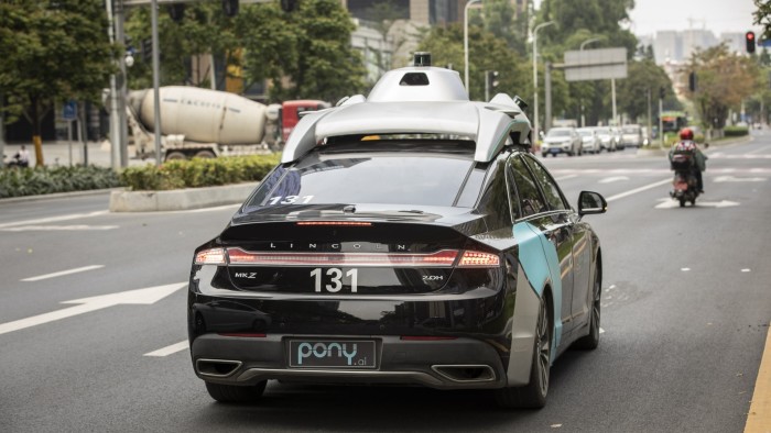 Rival robotaxi start-ups’ shares tank after Hong Kong listing A Pony.ai autonomous vehicle equipped with sensors drives on a city street in Guangzhou, China, during a demonstration.